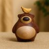 Hand-Carved Wooden Bear with Banana: Natural Wood Sculpture